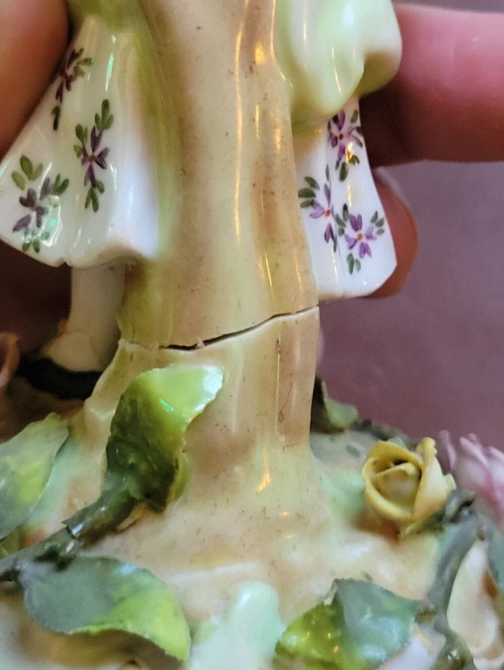 antique porcelain figurine, likely German from around 1900-repaired